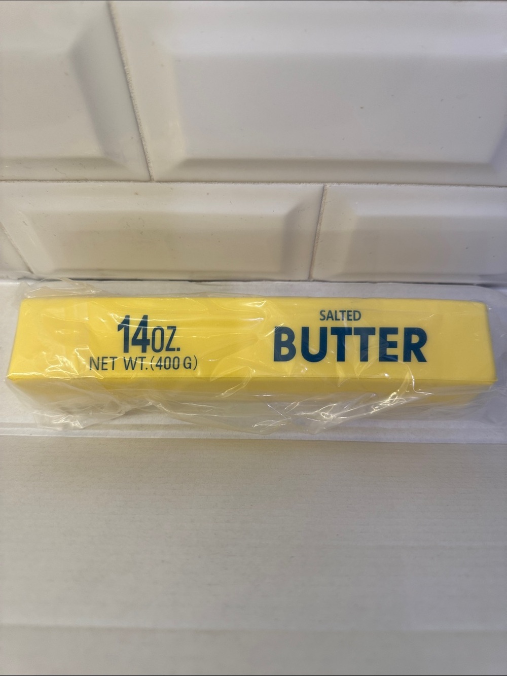 Butter Salted Sticks in Yellow Wrapper with Blue Text
